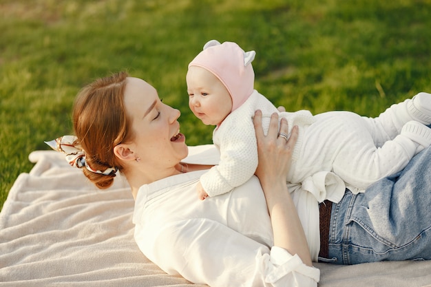 Family spend time in a summer garden