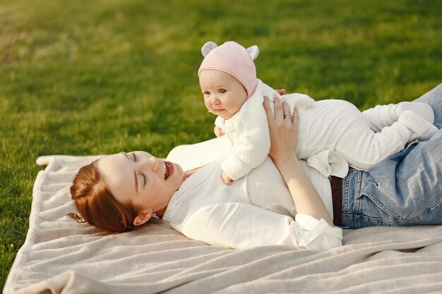 Family spend time in a summer garden