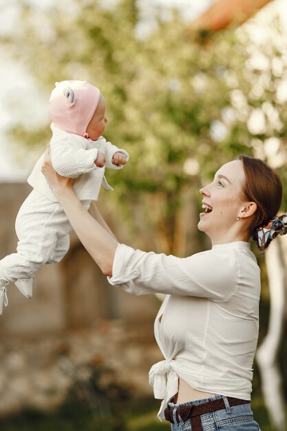 Family spend time in a summer garden