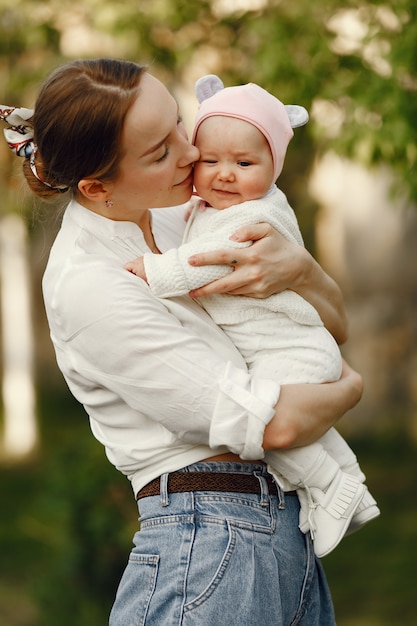 Free photo family spend time in a summer garden