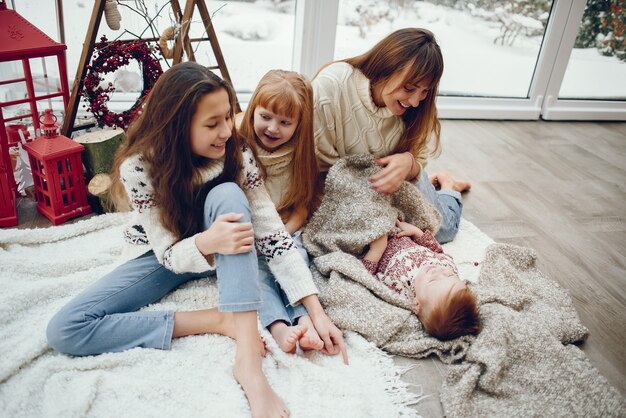 Family spending time at home in a christmas decorations