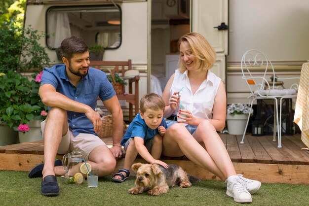 Family spending time together with their dog