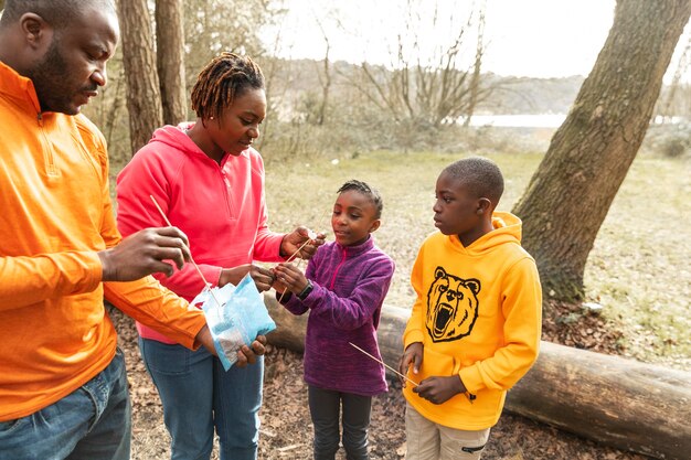 Family spending time together in the woods