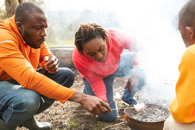 Family spending time together in the woods