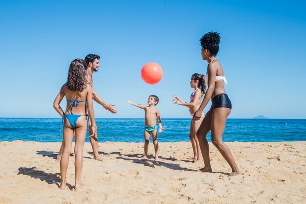 Family volley on the beach