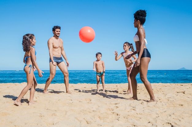 Family, volley and beach