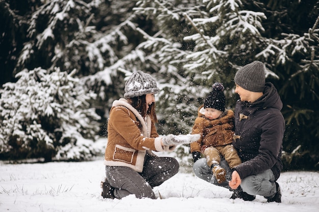 Family in a winter forest