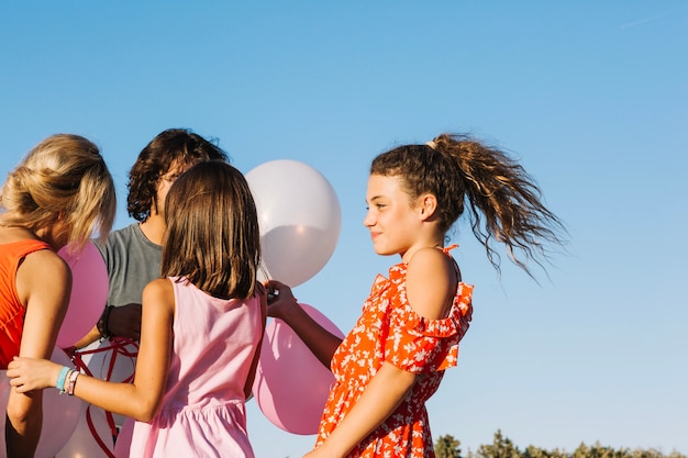 Free photo family with balloons