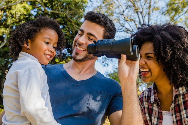 Free photo family with binoculars