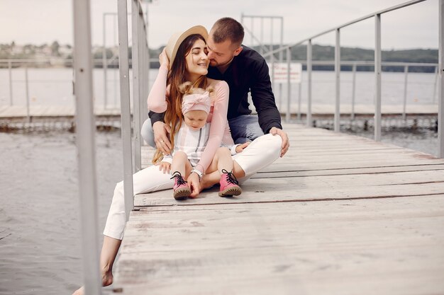 Family with daughter playing in a park