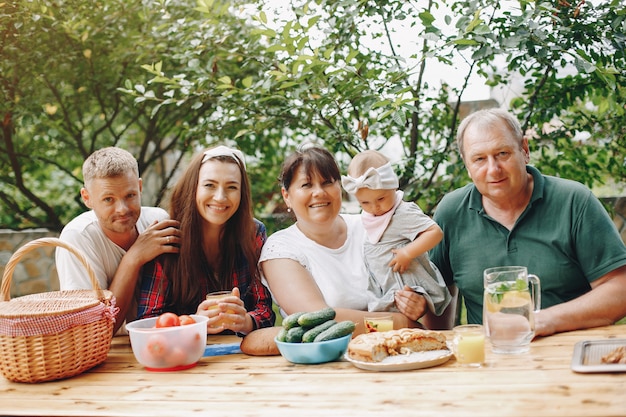 Family with daughter playing in the yard