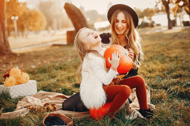 Family with pumpkins