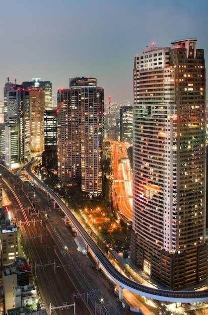 Famous shiodome area during evening time in minato, tokyo, japan