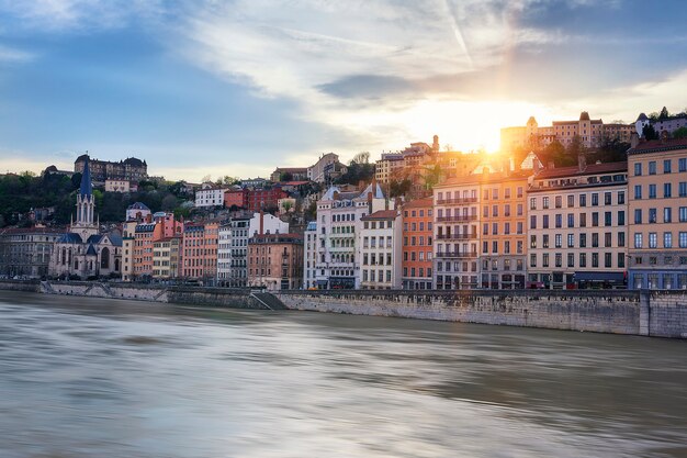 Famous view of Saone river in Lyon city at sunset, France