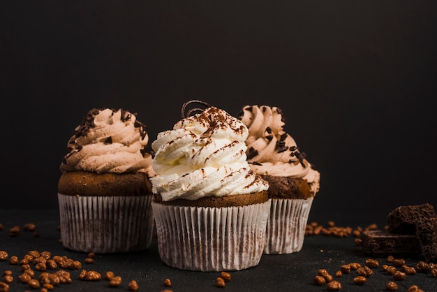 Fancy chocolate cupcakes with toppings and decoration