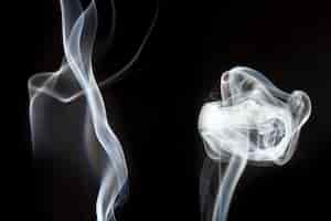 Foto gratuita fantastic sagome fumo bianco