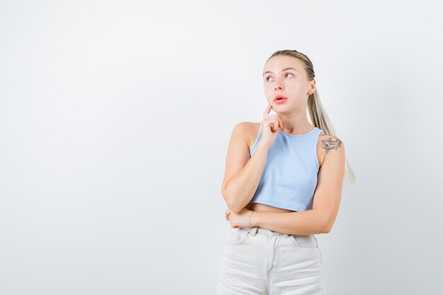 Faraway girl is thinking about something on white background