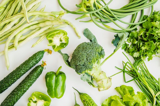 Farm fresh green vegetables isolated on white background