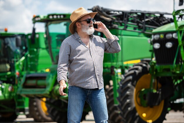 A farmer with tractors