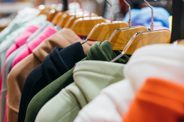 Fashion clothing on hangers at the show