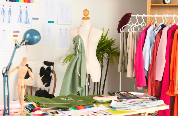Free photo fashion design studio for sewing and cutting clothes designer clothes manufacturing craft product