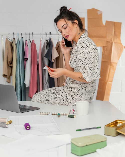 Fashion designer working in her workshop