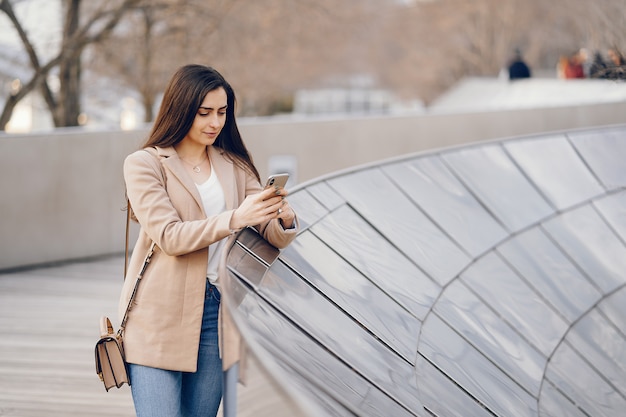 Fashion girl walking in a sspring park