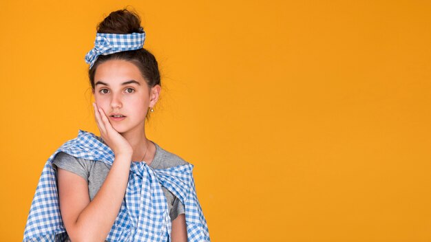 Fashion little girl posing with copy space