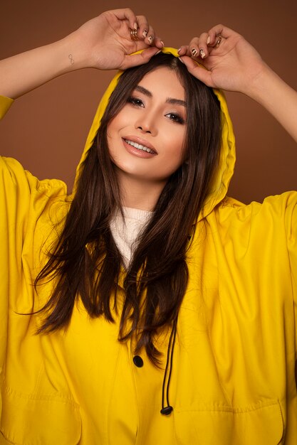 Fashion model in yellow cotton hoodie