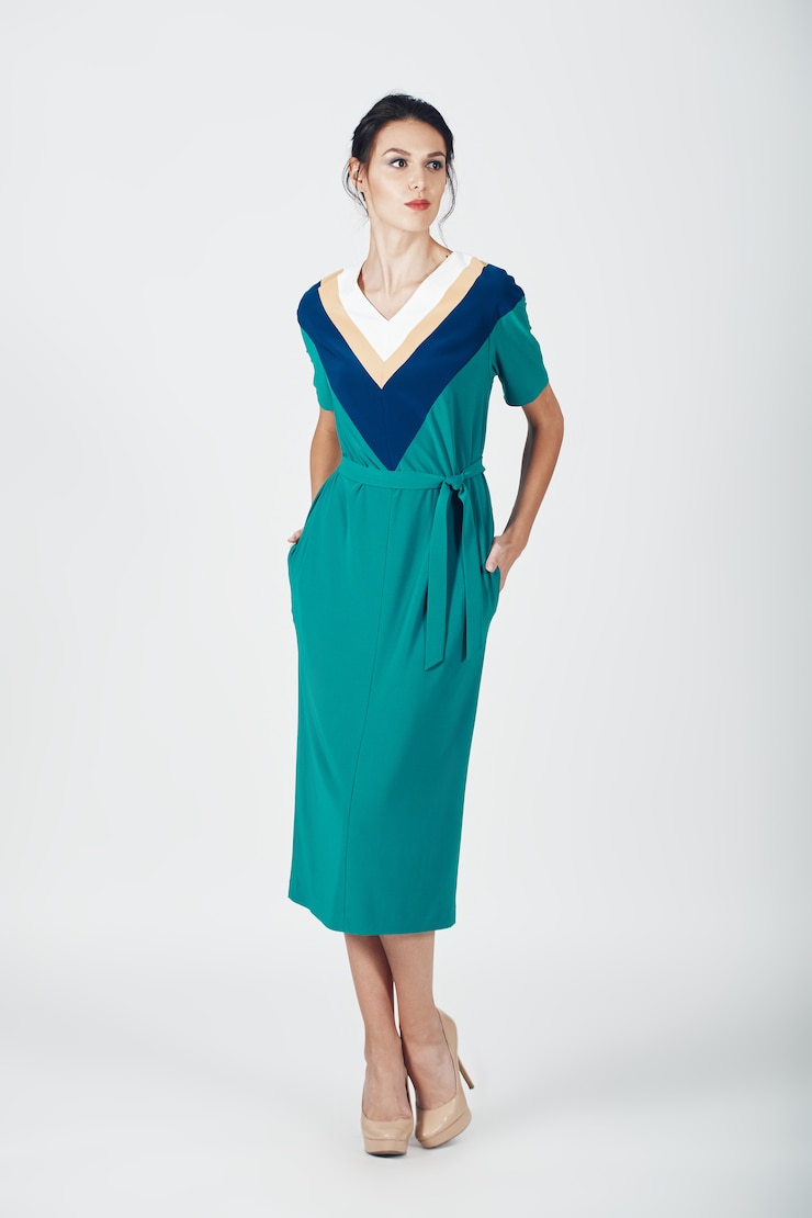 Free Photo fashion photo of young magnificent woman in a green dress