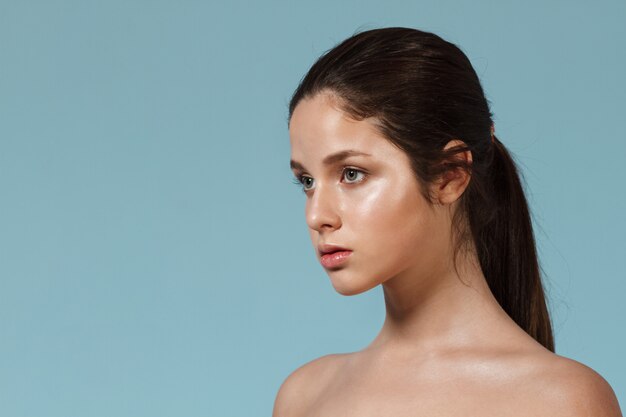 Fashion portrait of young beautiful woman with natural make up.