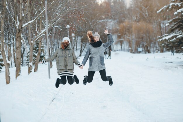 Free photo fashion positive gray coat girl