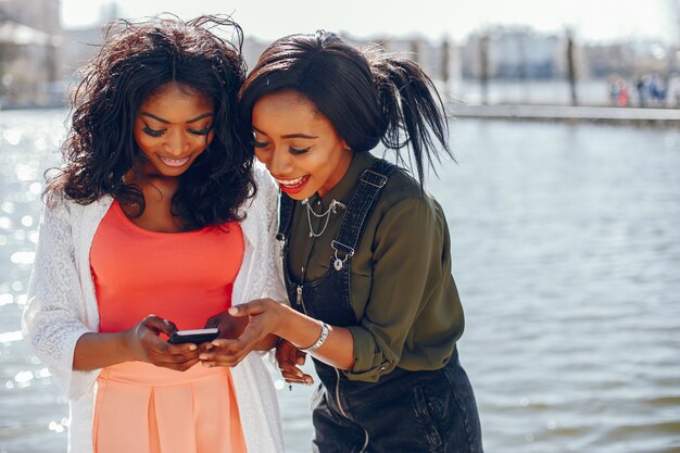 fashionable black girls in a park