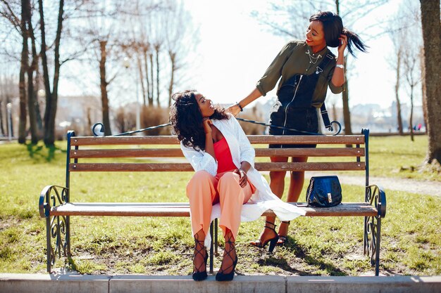 fashionable black girls in a park