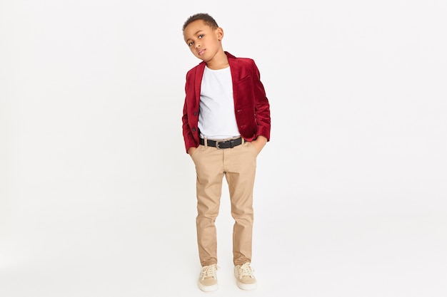 Free photo fashionable child with red blazer