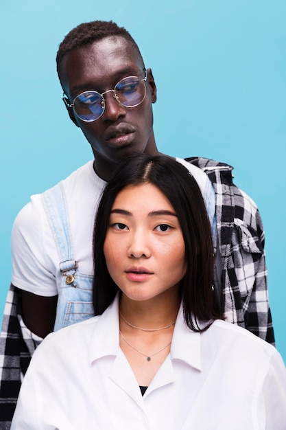 Free Photo fashionable couple posing in studio