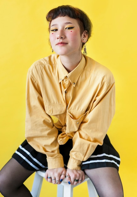 Fashionable girl posing in studio