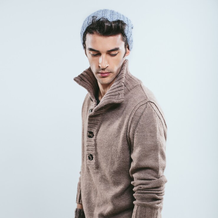 Free Photo fashionable man in winter knitted clothes