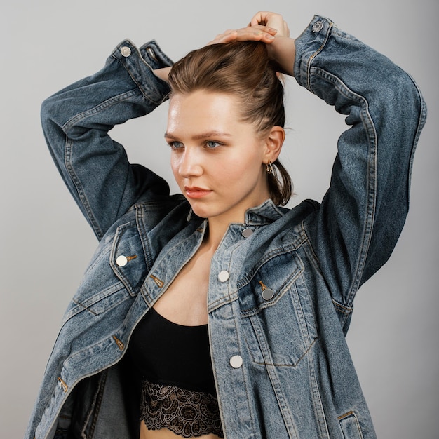 Fashionable woman wearing denim jacket