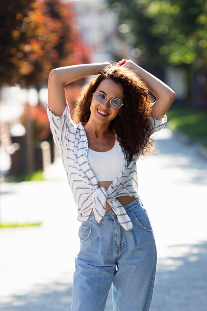 Fashionable young woman posing