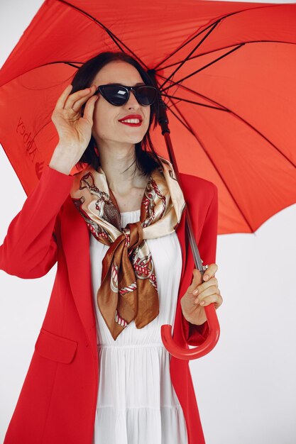 Fashionista girl. Woman on a white background. Stylish lady.