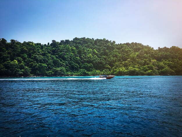 Fast boat navigating on the river 