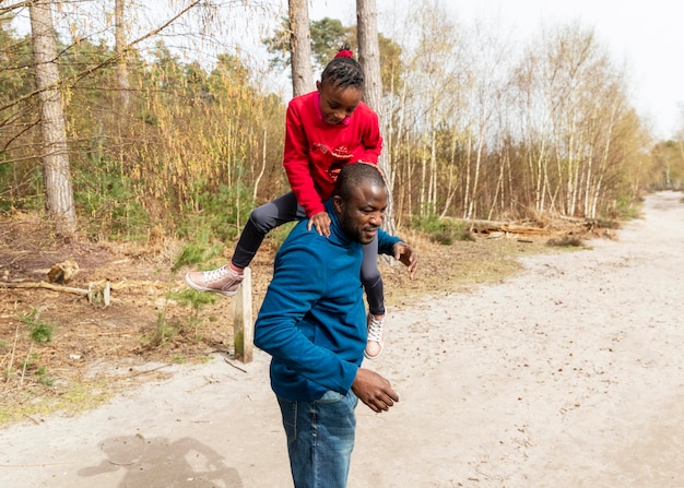 Father and child having fun together outdoors