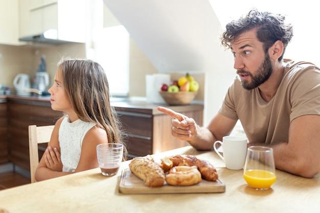 Free photo father and daughter having an argument