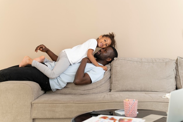 Father and daughter having fun