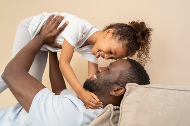 Father and daughter having fun