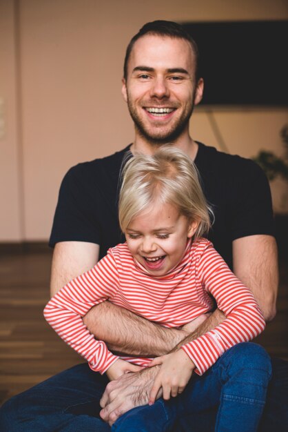 Father and daughter laughing