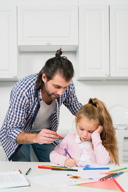 Father and daughter painting