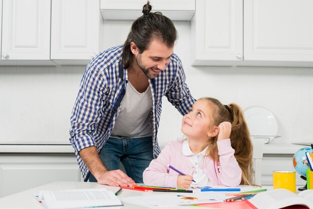 Father and daughter painting