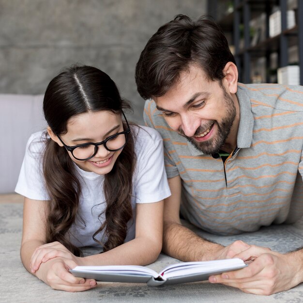 Father and daughter reading